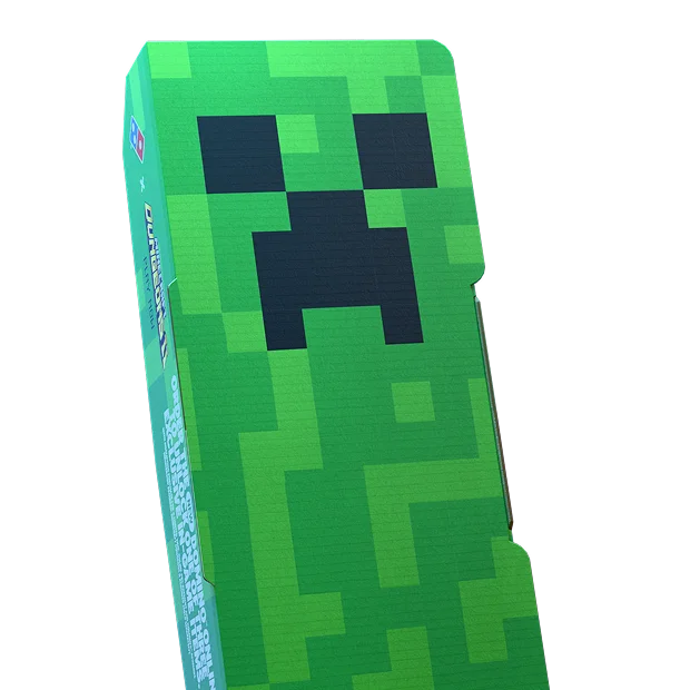 The Creeper collectible Domino's box: a green pixel-art Creeper face wrapped around a pizza box.